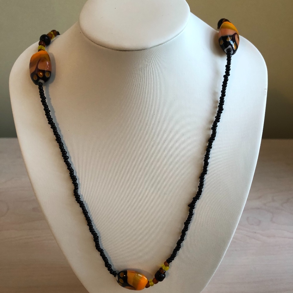 Handmade Black Beaded Necklace with Sunkist, Amber, and Black Colored Beads